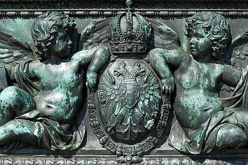 Vienna, Austria. Bronze detail of angels and royal crest Games and Sports Print